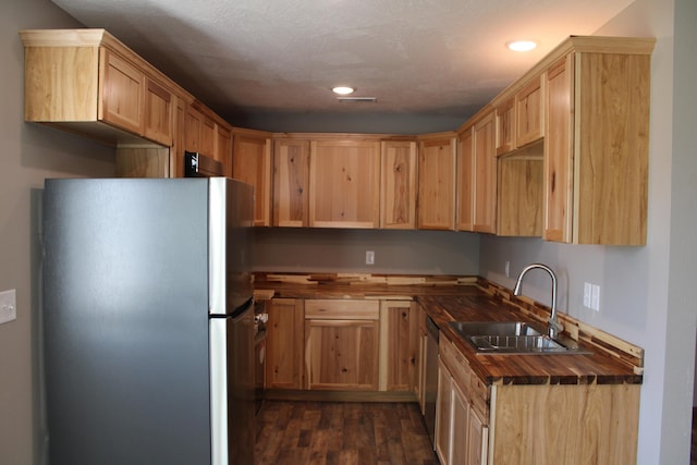 430 Park St, Taneyville, MO 65759 - kitchen featuring appliances with stainless steel finishes, a sink, dark wood-type flooring, recessed lighting, and light brown cabinetry