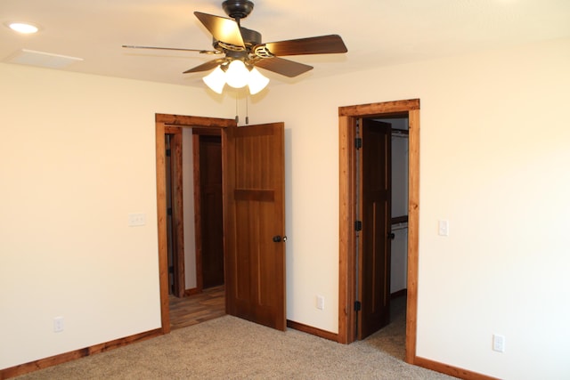 430 Park St, Taneyville, MO 65759 - unfurnished bedroom with light carpet, baseboards, and ceiling fan