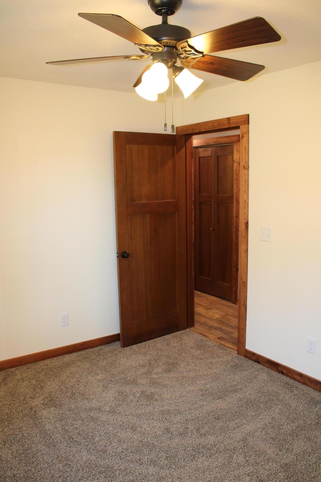 430 Park St, Taneyville, MO 65759 - unfurnished room featuring carpet flooring, baseboards, and a ceiling fan
