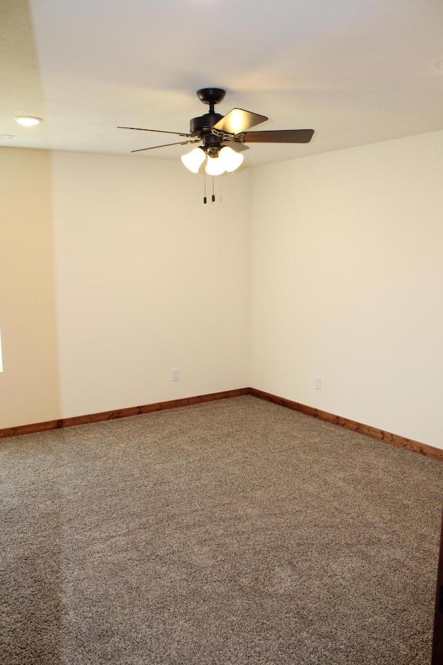 430 Park St, Taneyville, MO 65759 - empty room featuring a ceiling fan, carpet floors, and baseboards