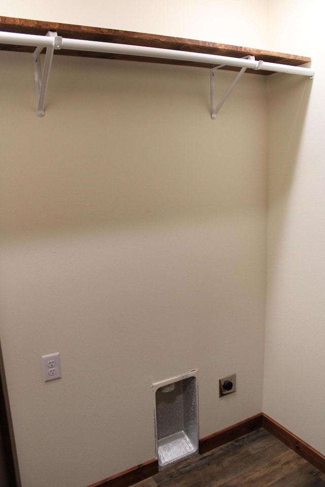 430 Park St, Taneyville, MO 65759 - laundry area with electric dryer hookup, dark wood-type flooring, and baseboards
