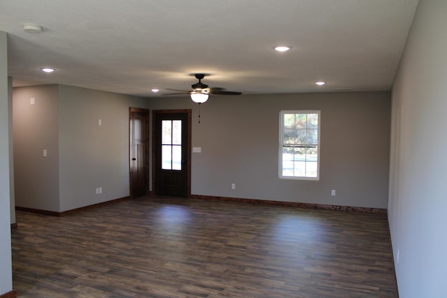 430 Park St, Taneyville, MO 65759 - empty room with dark wood-style flooring, healthy amount of natural light, baseboards, and recessed lighting