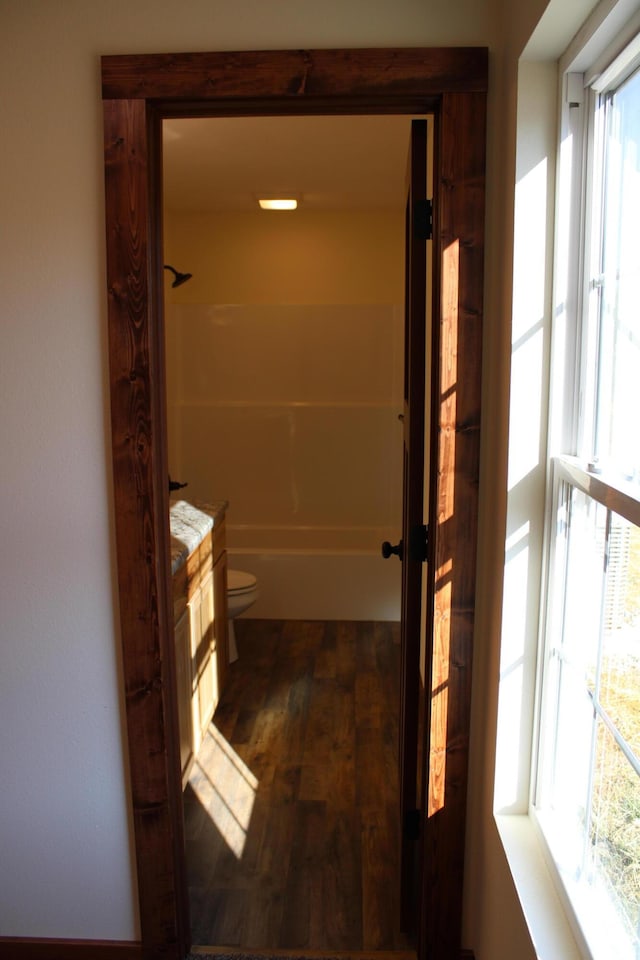 430 Park St, Taneyville, MO 65759 - full bathroom featuring toilet, wood finished floors, vanity, and shower / bathtub combination