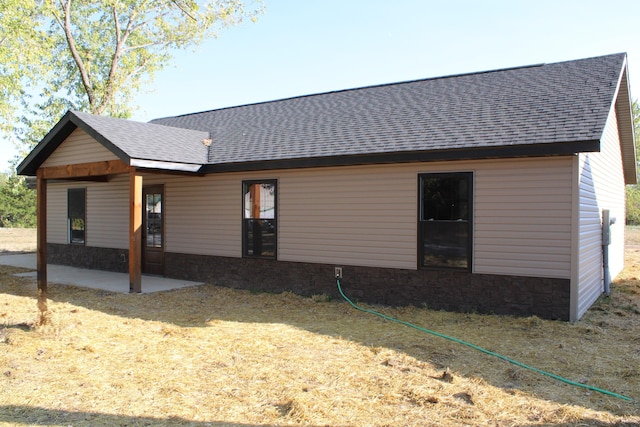 430 Park St, Taneyville, MO 65759 - rear view of property with roof with shingles and a patio