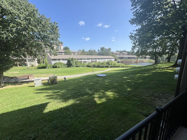 view of yard with a water view