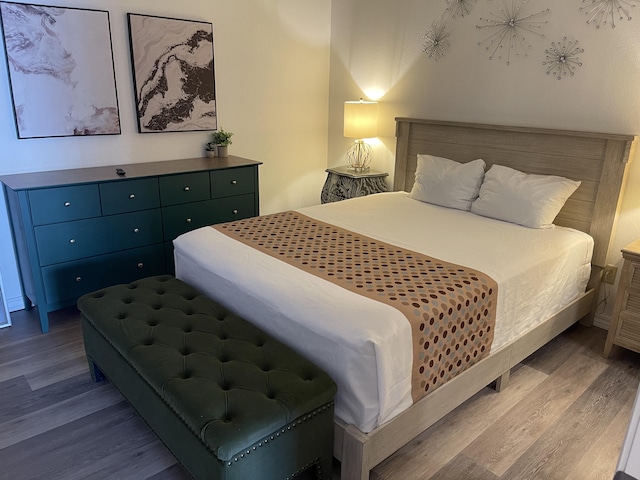 bedroom featuring hardwood / wood-style flooring