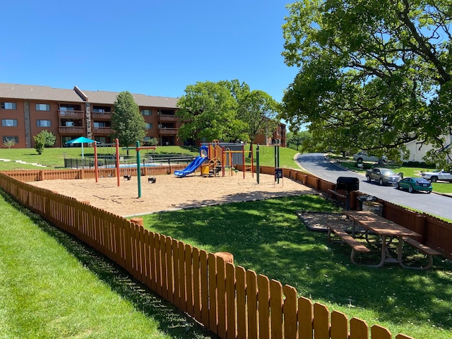 view of play area with a yard