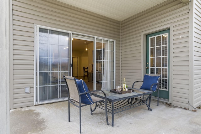 view of patio with a fire pit