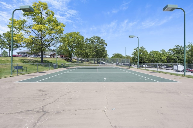 exterior space with tennis court