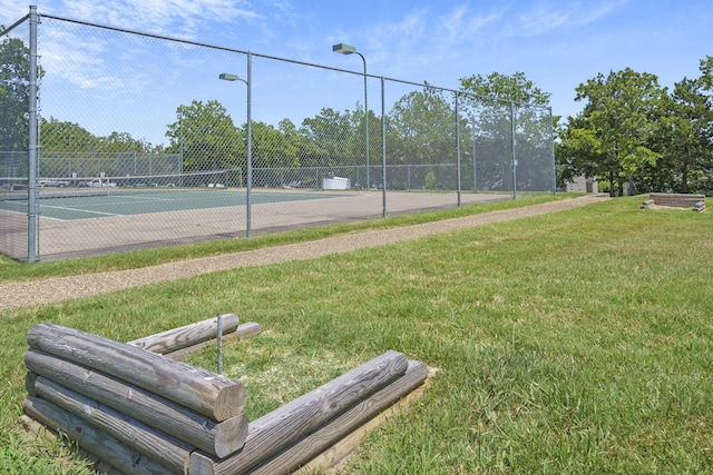 835 Fairview Unit 4, Branson, MO 65616 - view of tennis court with fence and a yard