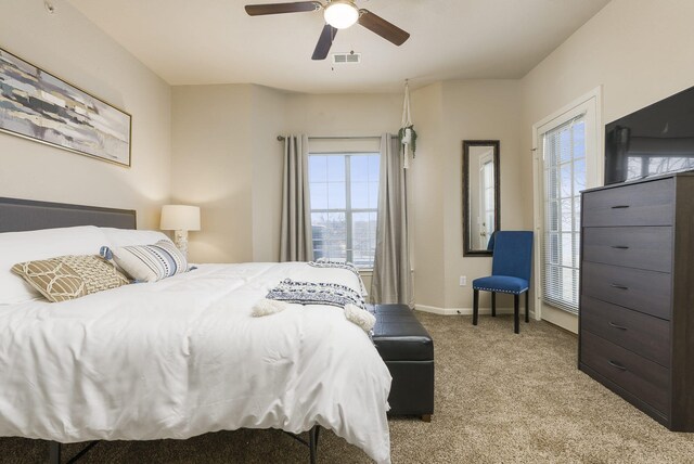 835 Fairview Unit 4, Branson, MO 65616 - carpeted bedroom with visible vents, a ceiling fan, and baseboards