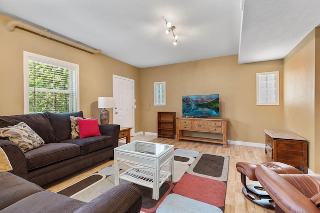 89 Turkey Trl, Blue Eye, MO 65611 - living room with baseboards and light wood-type flooring
