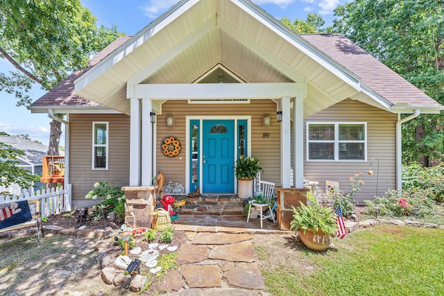 view of front of property featuring covered porch