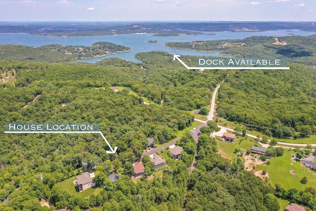 89 Turkey Trl, Blue Eye, MO 65611 - aerial view featuring a wooded view and a water view