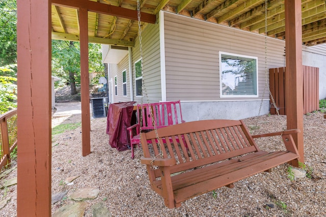 wooden terrace with central air condition unit