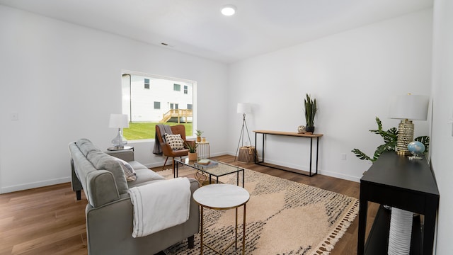 living area featuring dark hardwood / wood-style flooring