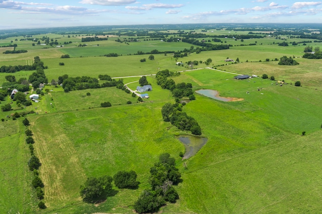 drone / aerial view with a water view and a rural view