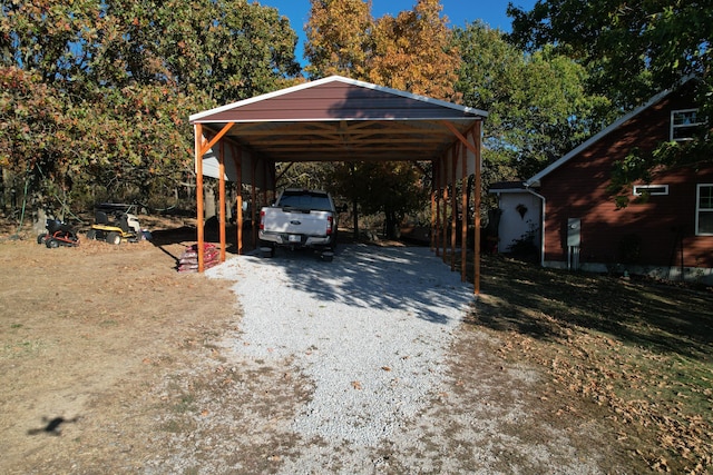 view of parking / parking lot with a carport