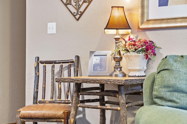 dining area with a textured wall