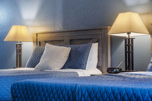 bedroom with a textured wall