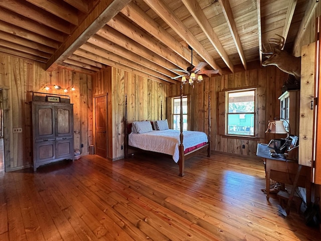 unfurnished bedroom featuring light wood-type flooring, beamed ceiling, wooden walls, and wooden ceiling