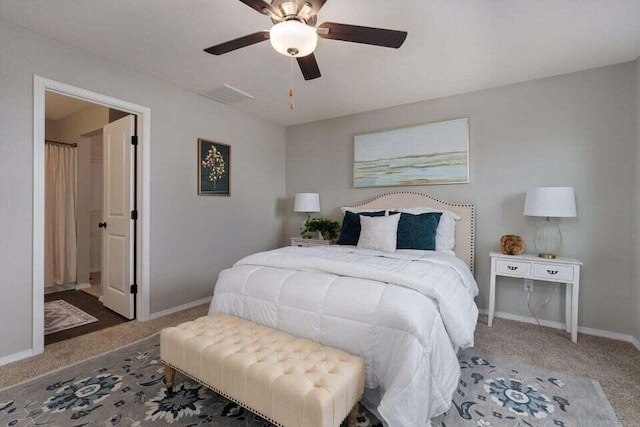 bedroom with ceiling fan and carpet