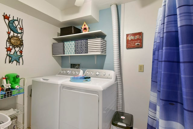 clothes washing area featuring washing machine and dryer