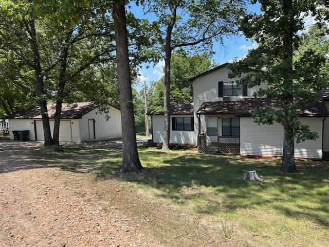 43 Dale Dr, Kimberling City, MO 65686 - exterior space featuring a front lawn and an outdoor structure