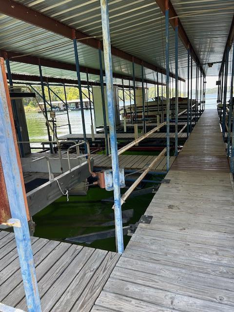 43 Dale Dr, Kimberling City, MO 65686 - view of dock featuring boat lift and a water view