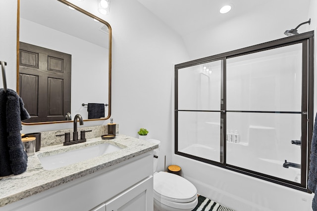 full bathroom with lofted ceiling, toilet, vanity, and enclosed tub / shower combo