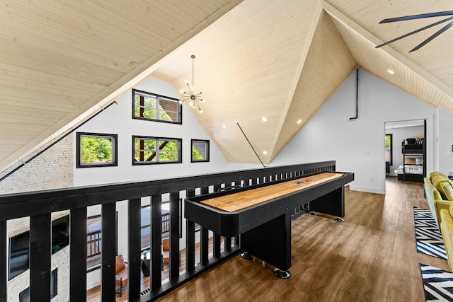 rec room featuring wood-type flooring, an inviting chandelier, vaulted ceiling, and wood ceiling