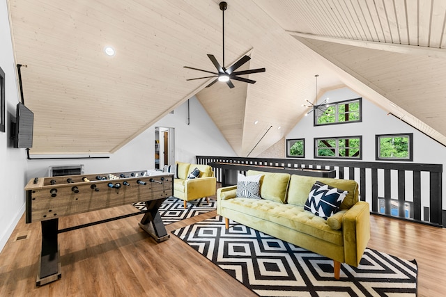 living room featuring wood-type flooring, lofted ceiling, ceiling fan, and wooden ceiling