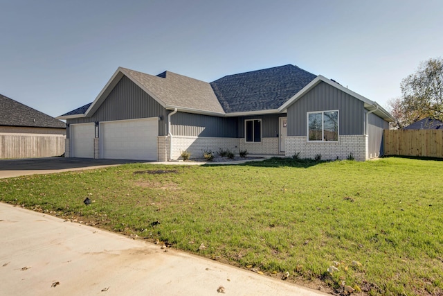 3668 W Overland St, Springfield, MO 65807 - ranch-style home featuring a garage, roof with shingles, concrete driveway, and brick siding