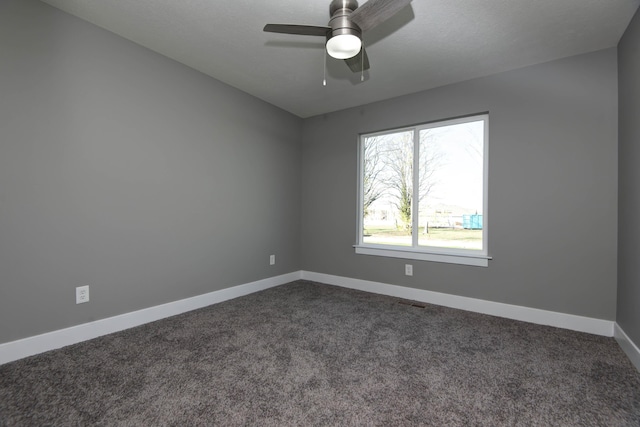 3668 W Overland St, Springfield, MO 65807 - unfurnished room with dark colored carpet, baseboards, and ceiling fan