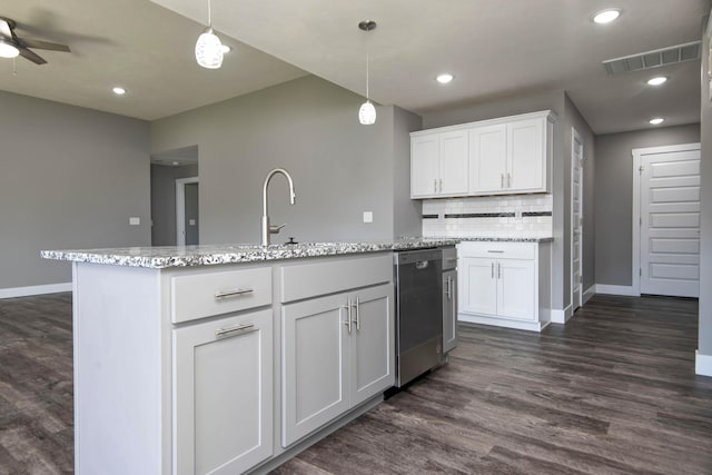 3668 W Overland St, Springfield, MO 65807 - kitchen featuring dishwasher, baseboards, dark wood finished floors, a center island with sink, and recessed lighting
