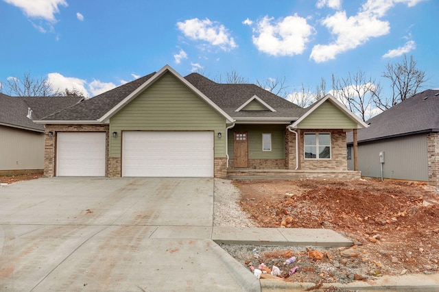 view of front of property featuring a garage