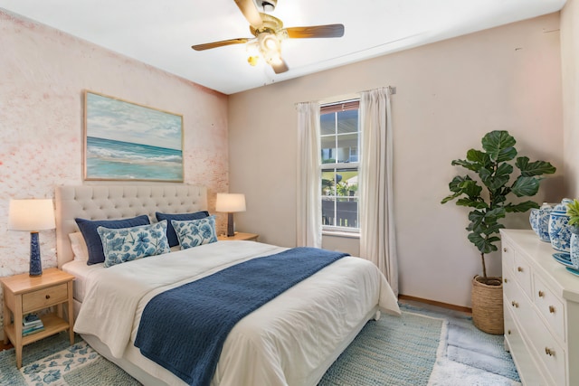 carpeted bedroom with ceiling fan