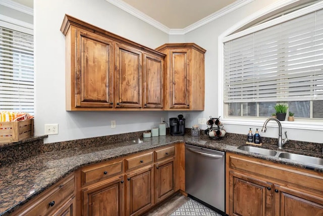 kitchen with dishwasher, dark stone counters, crown molding, and sink