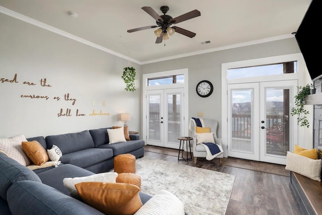 living room featuring french doors, crown molding, dark hardwood / wood-style flooring, and ceiling fan