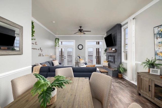 dining area with dark wood-type flooring, ceiling fan, french doors, and a healthy amount of sunlight