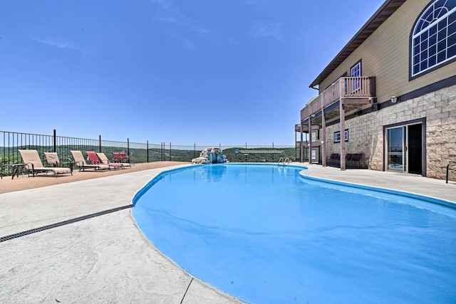 view of pool with a patio area