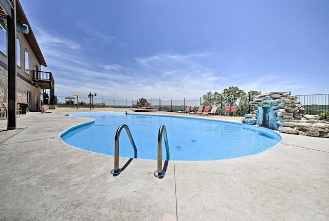 view of pool with a patio area