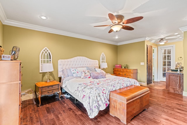 bedroom featuring ornamental molding, ceiling fan, and hardwood / wood-style floors