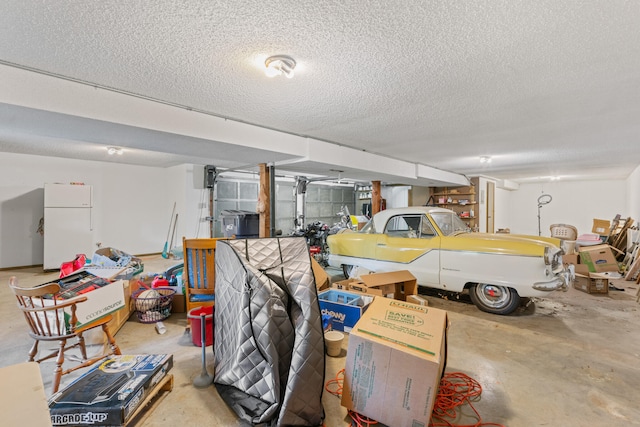 garage featuring white refrigerator