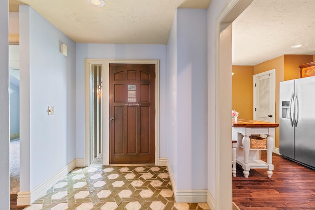 foyer featuring hardwood / wood-style floors