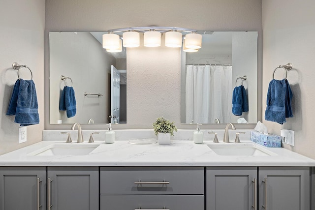 132 Highland Dr Unit 8, Branson, MO 65616 - bathroom with a shower with curtain, a sink, and double vanity