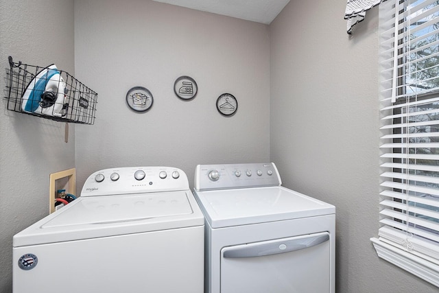 132 Highland Dr Unit 8, Branson, MO 65616 - clothes washing area featuring washer and dryer and laundry area