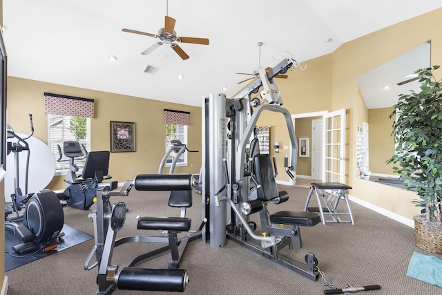 workout area featuring lofted ceiling and ceiling fan