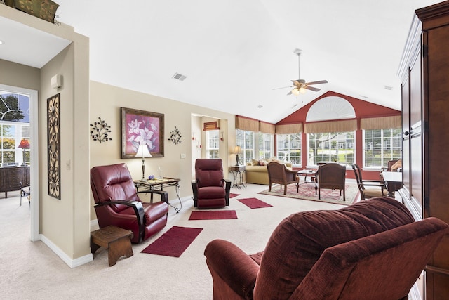 carpeted living room featuring ceiling fan and high vaulted ceiling