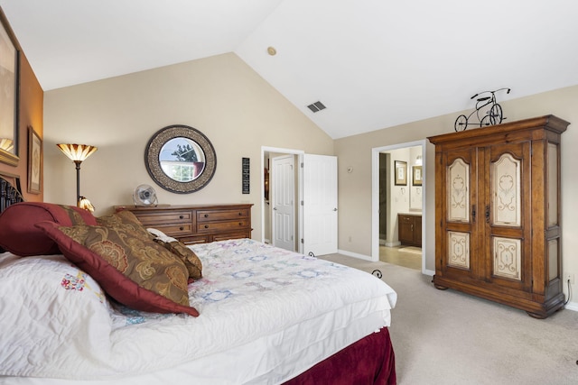 carpeted bedroom featuring vaulted ceiling